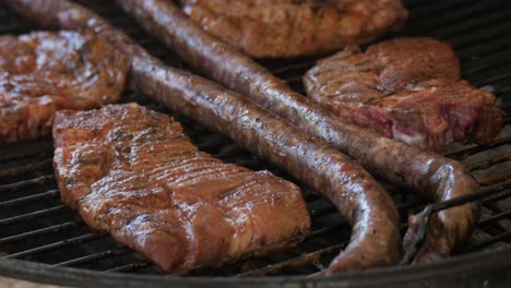 traditional south african barbecue with chops and sausage close up