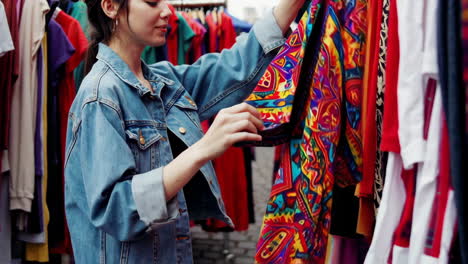 woman shopping at a vintage clothing market