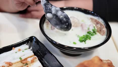 savoring traditional hong kong rice porridge dish