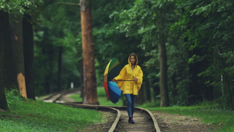 good looking woman strolling in a park