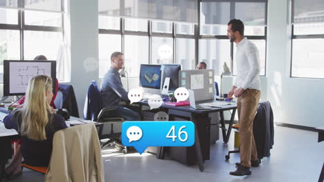 animation of message icon with increasing numbers over two diverse men high fiving at office