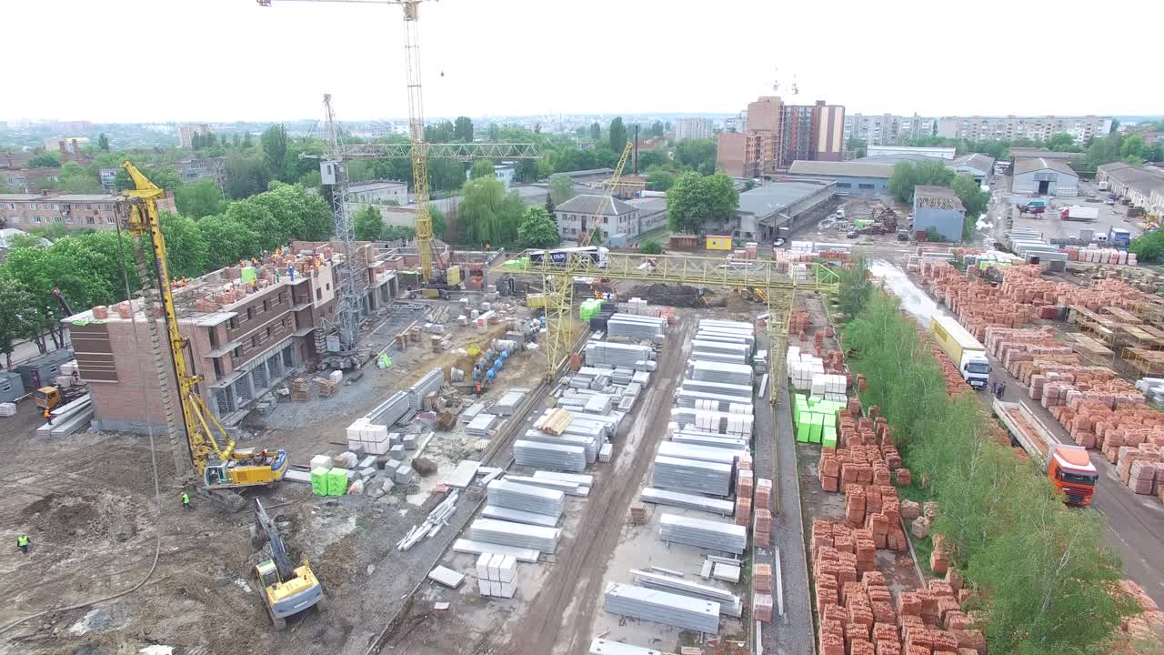 Aerial shot of the construction building site, new homes being built