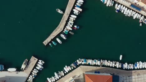 beautiful fishing village port on island of cres, croatia, aerial top down view