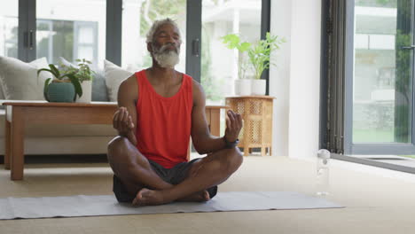 Video-of-african-american-senior-man-meditating