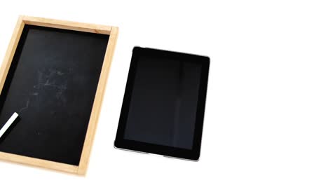 Digital-tablet-and-slate-on-white-background