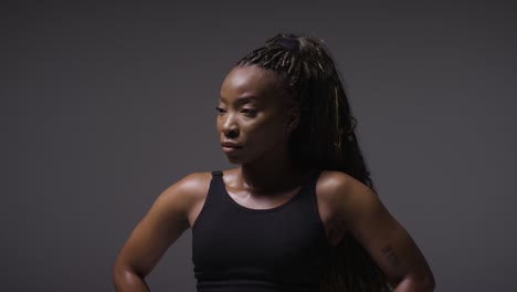 Studio-Portrait-Of-Young-Woman-Wearing-Gym-Fitness-Clothing-For-Exercise-3