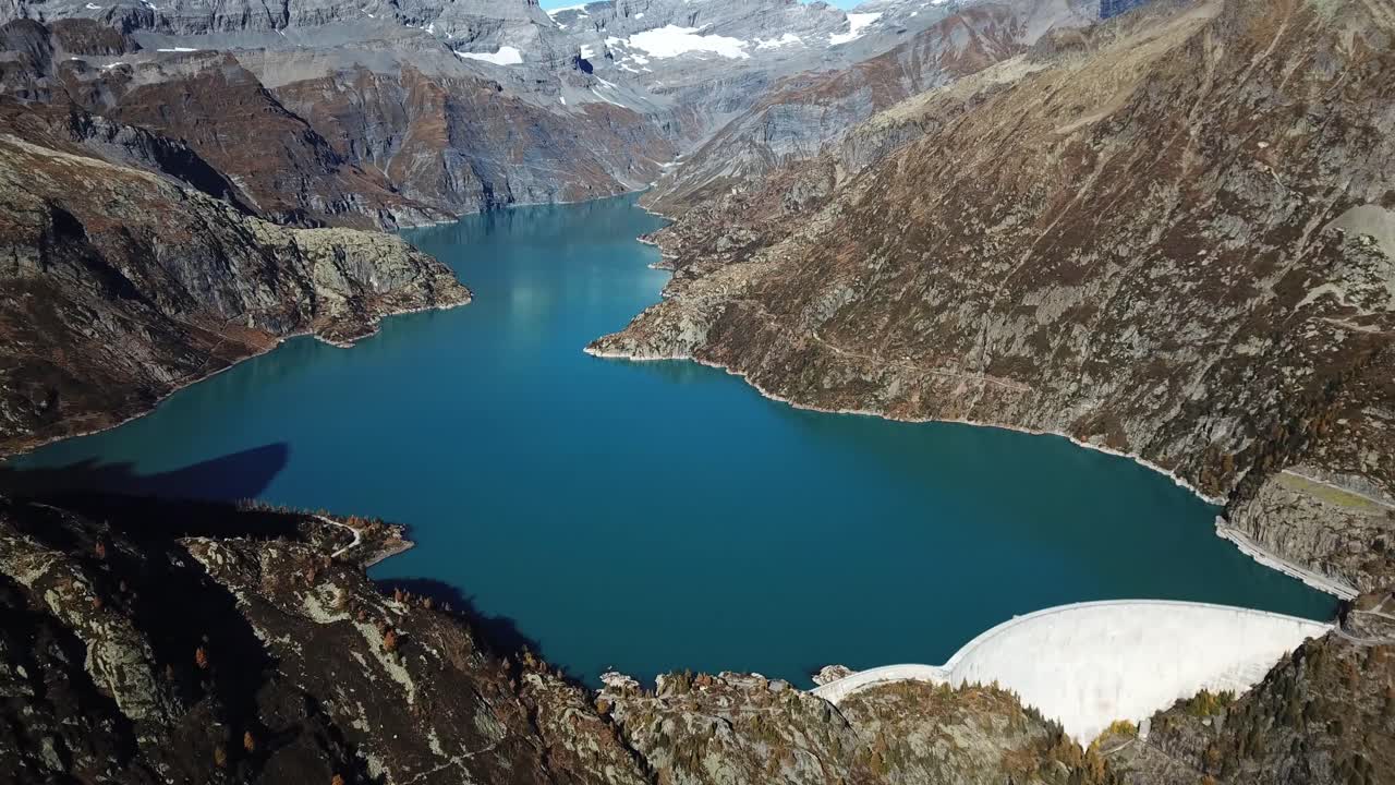 Drone flying slowly to capture impresive views of the Barrage d'Émosson, Switzerland.