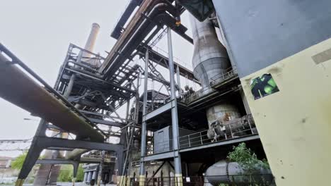 industrial-building-with-lots-of-pipes-and-steel-braces-in-landscape-park-Duisburg-Nord-in-Germany