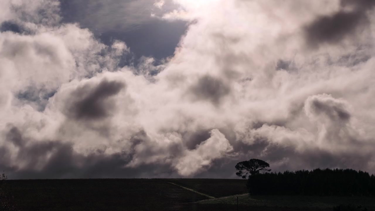 Stormy Clouds on a Farm at Sunset, Time Lapse 4K