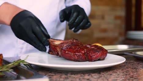 chef preparing a grilled steak