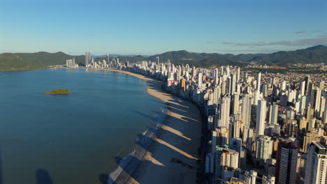 aerial view of balneario camboriu's coastline with skyscrapers and beach