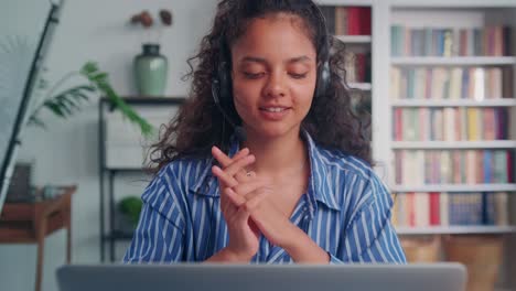 indian woman works in customer support service consults via ip telephony