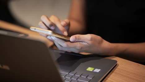 close up of woman hands using laptop computer, indoors