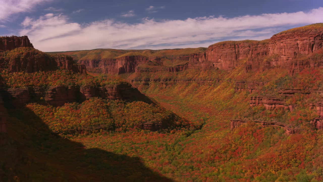 Vibrant Autumn Foliage in a Grand Canyon-like Landscape