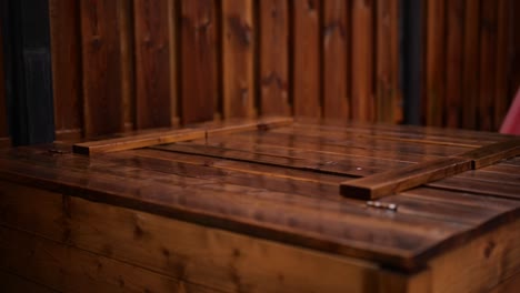 Raindrops-On-A-Wooden-Surface-During-A-Storm