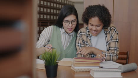 students studying together in library