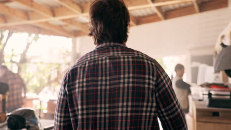 carpenter man, back pain and muscle in workshop