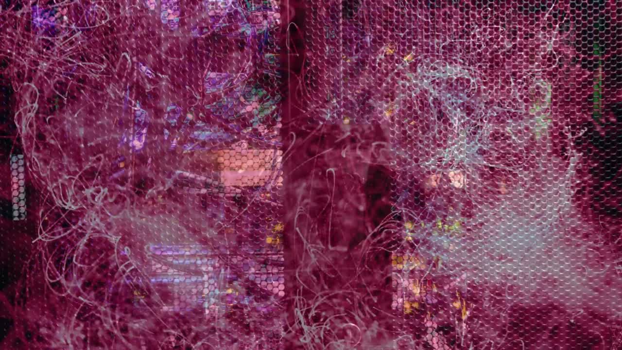 Magenta filaments emerging from left, spreading across metal mesh, showing LED circuitry technology