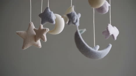 baby room with crib and mobile