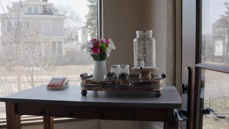 medium shot of a beverage and drink cart on a porch on a sunny day