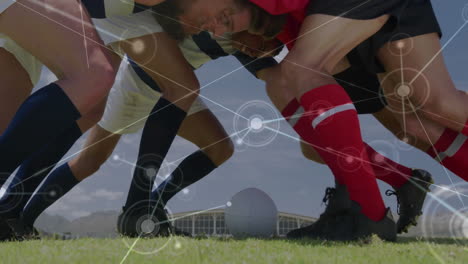 rugby players in scrum with animated network connections overlay on field