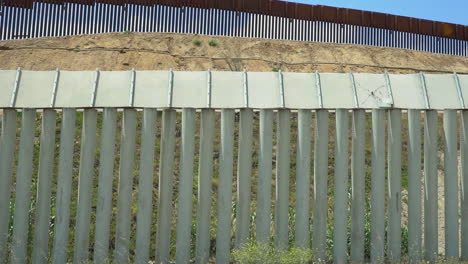 double border fence dividing united states and mexico near san ysidro, california