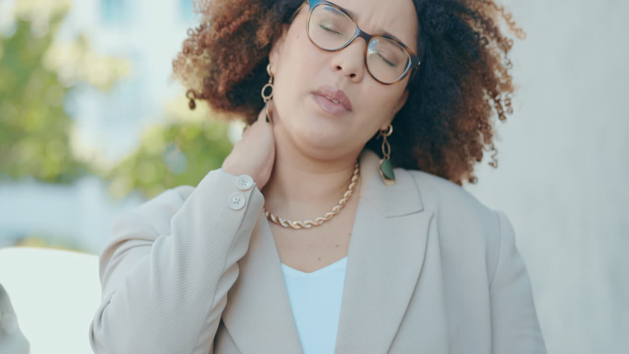 Business woman, neck pain and stress in street
