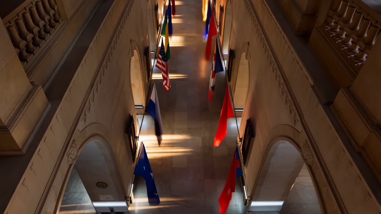 Hallway with International Flags and Sunlit Rays
