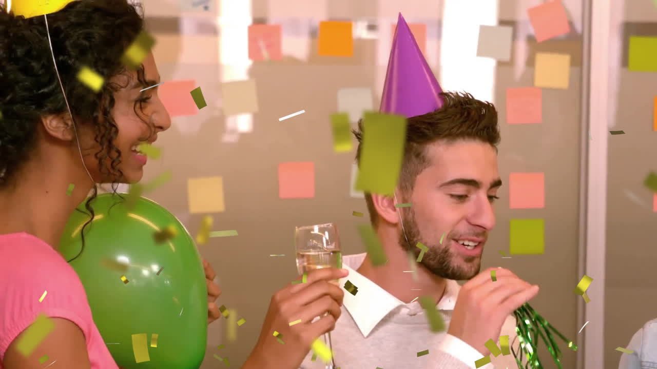 Confetti falling animation over people celebrating with party hats and drinks