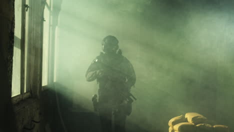 soldier in a tactical operation in a building with smoke