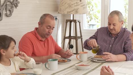 Tranquil scene of a happy family having a traditional breakfast together