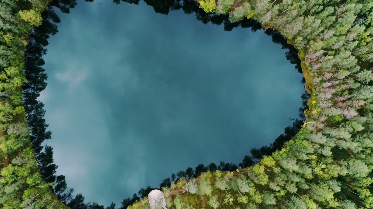 Čertoka Lake, hidden gem in Latgale, Latvia, lush forest, circular form, drone