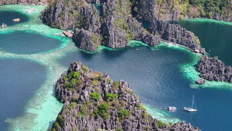 sharp limestones rocks at twin lagoon in coron islands, philippines. aerial shot