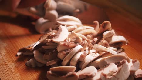 sliced mushrooms on a cutting board