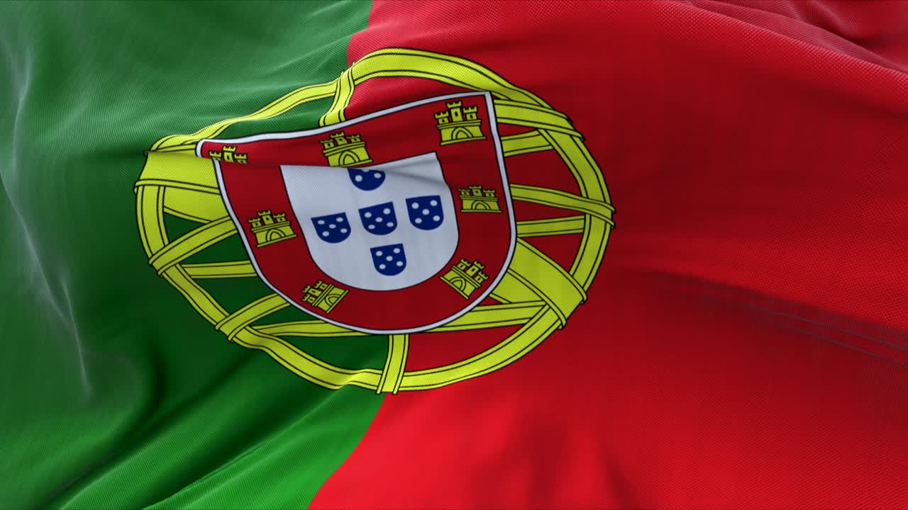 Detalje af Portugals nationalflag, der blafrer i vinden