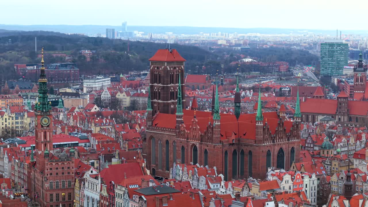 Aerial view of Gdansk Old Town with St. Mary's Church, shipyard visible in the distance