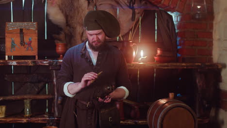 merchant checks magic herbs in store. worried bartender in medieval costume holds potion of ingredients in metal container in tavern. seller secrets