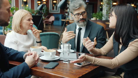 business team meeting in a coffee shop