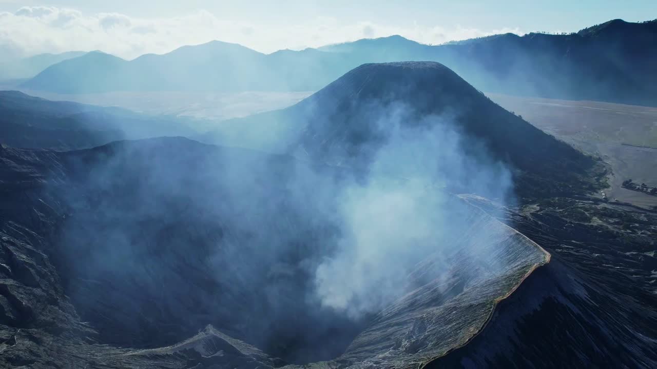 Mount Bromo with misty views, Mount Batok behind, scenic East Java sight