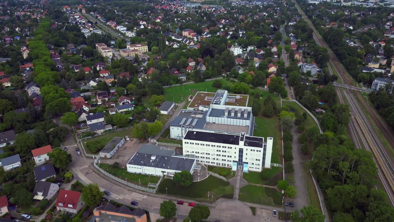 Explore the cutting-edge technology and futuristic infrastructure of a large-scale data center. Best aerial view flight wide orbit overview drone