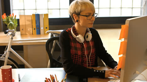 female graphic designer working on computer