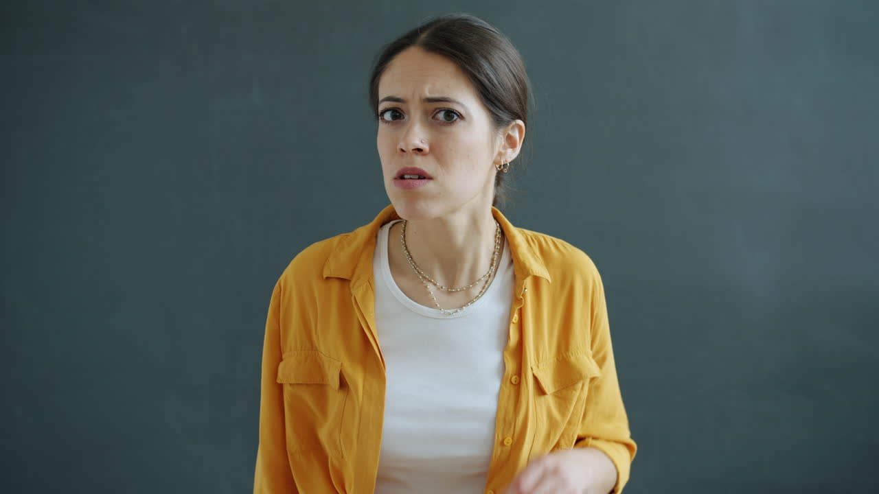 Woman expressing frustration and confusion