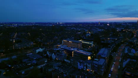 arnhem klarendal residential district drone in twilight with houses and offices cityscape