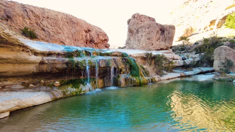 a waterfall in the middle of the sahara desert algeria biskra