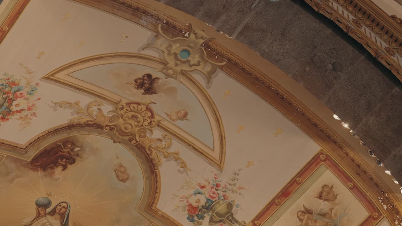 Intricate sacred fresco with Marian imagery and baroque ornamentation