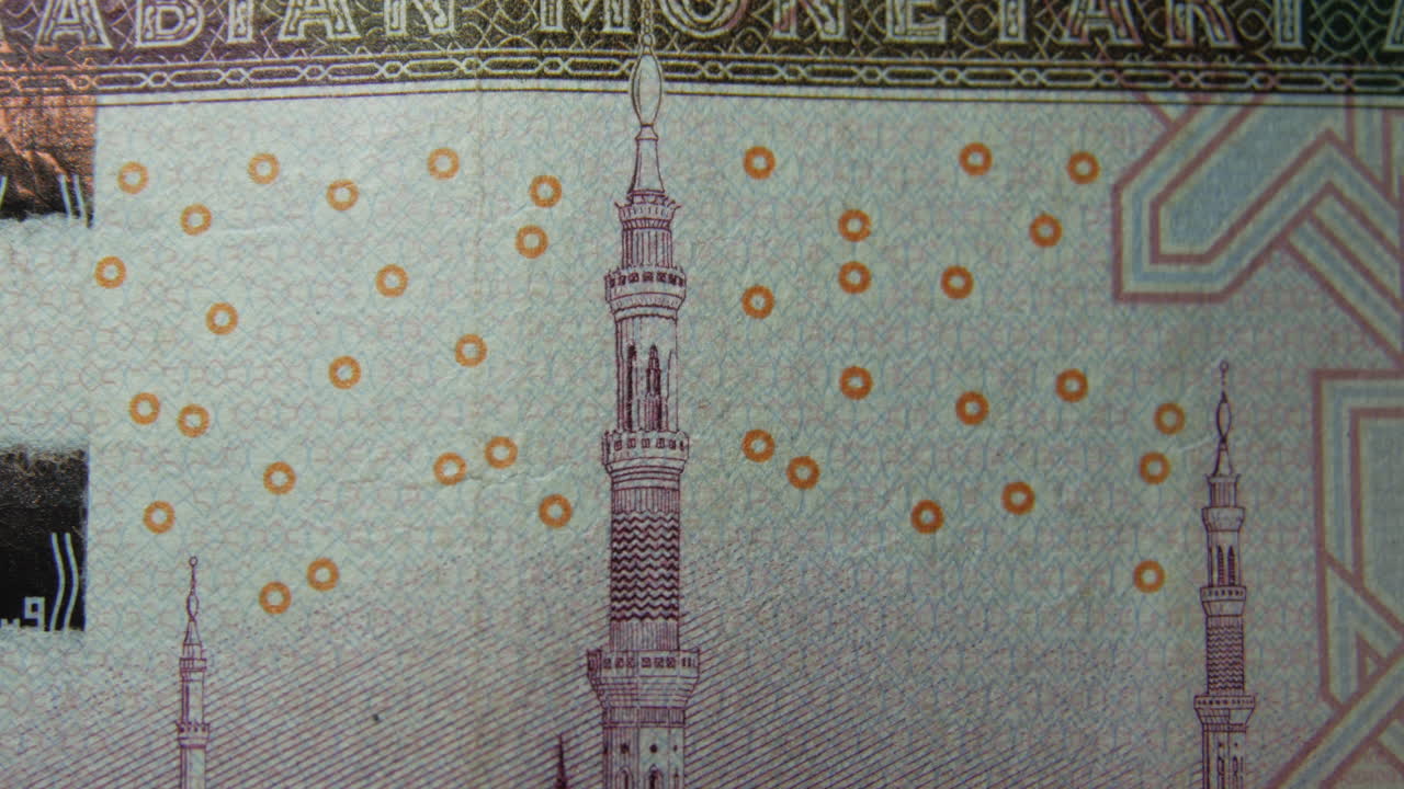 This is the Macro view of a normal paper bank not- money- currency ofSaudi Arabia 100 Riyals bill