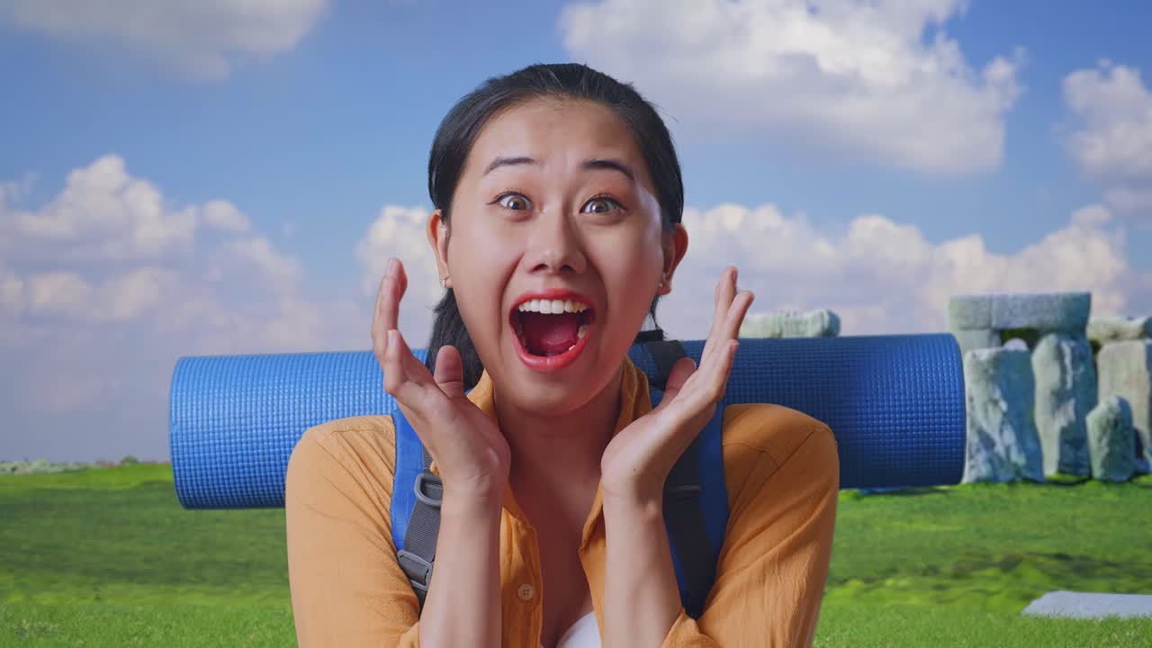 Close Up Of Asian Female Hiker With Mountaineering Backpack Saying Wow While Traveling In Stonehenge