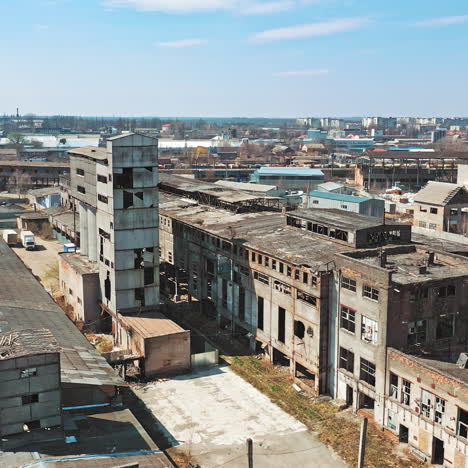 abandoned building. aerial view of an old factory ruin and broken windows.