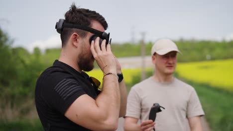 video production team prepare fpv drone equipment before flight, czechia