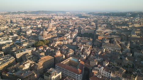 Panoramic-aerial-overview-above-old-historic-dense-patterned-home-buildings-of-Orange-Garden-Italy